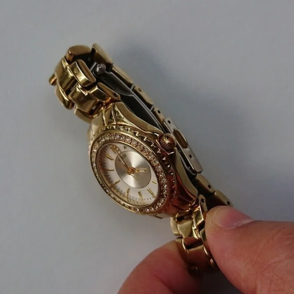 Guess Analog gold tone with rhinestones Watch